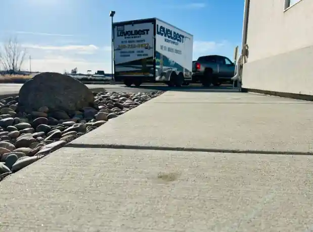 After: the same two slabs lifted level across the joint