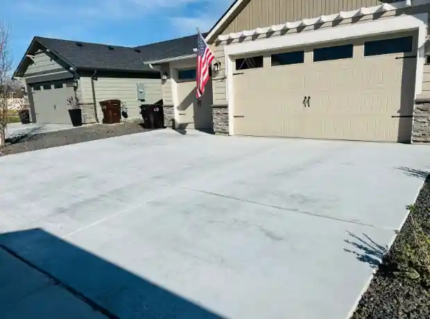 Concrete driveway after cleaning, panels bright and free of stains